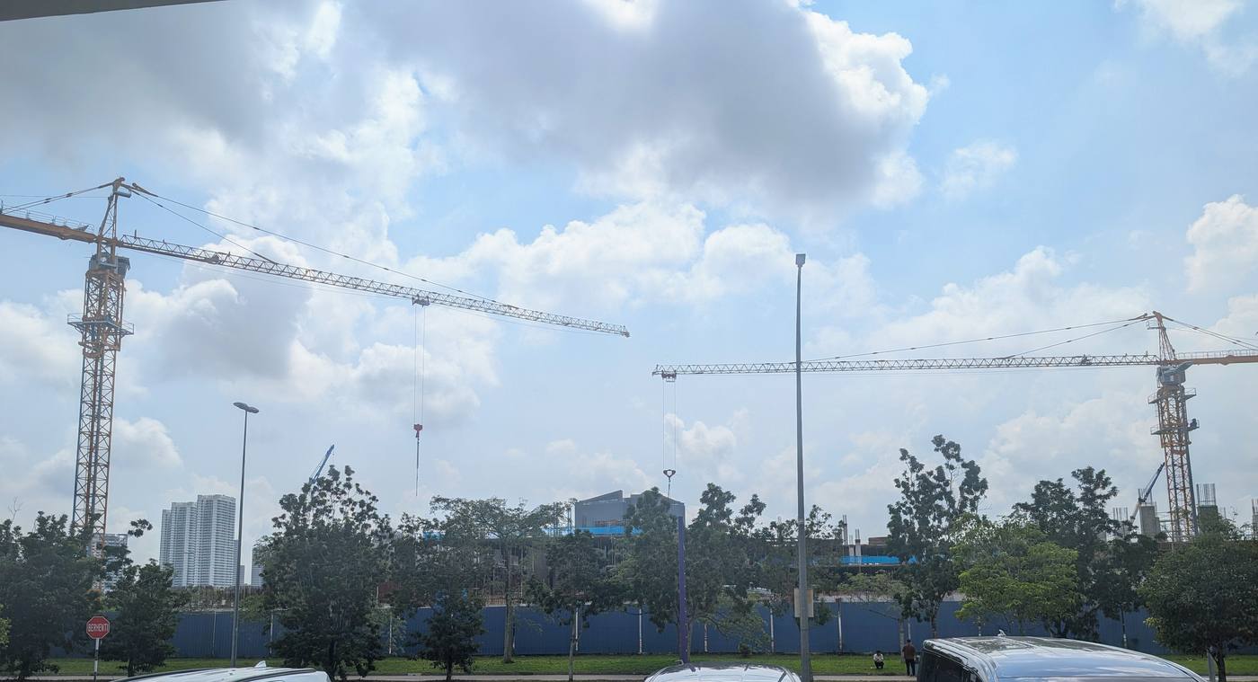 Construction cranes over the Bodaiju Residences site at Medini, July 2026